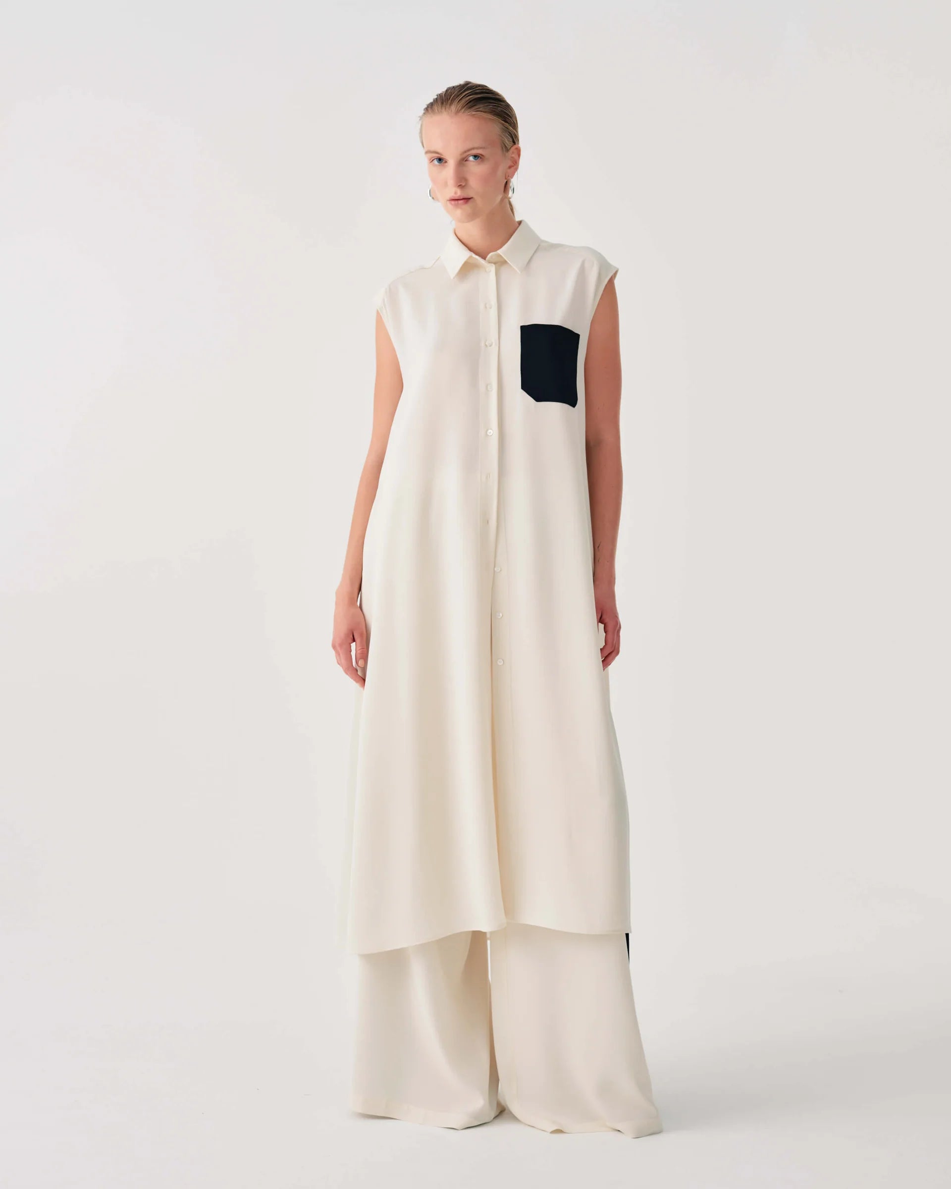 BEA-26FE6697SAT IVORY SLEEVELESS POCKET DRESS