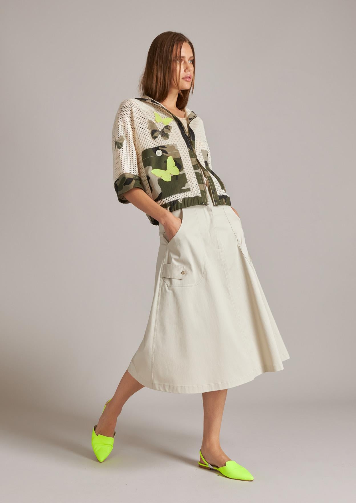 Beige and green hooded top